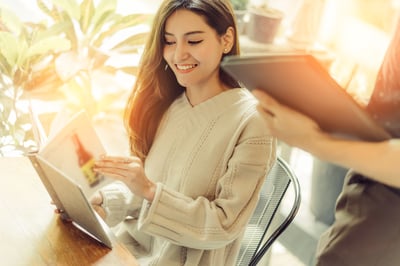 woman reading menu